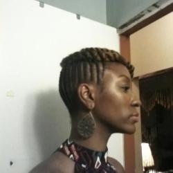 Chic updo for black hair at Sabines Hallway Natural Hair Salon & Spa in Brooklyn, NY.