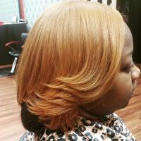 Radiant color,cut & style on natural hair