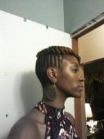 Chic updo for black hair at Sabines Hallway Natural Hair Salon & Spa in Brooklyn, NY.